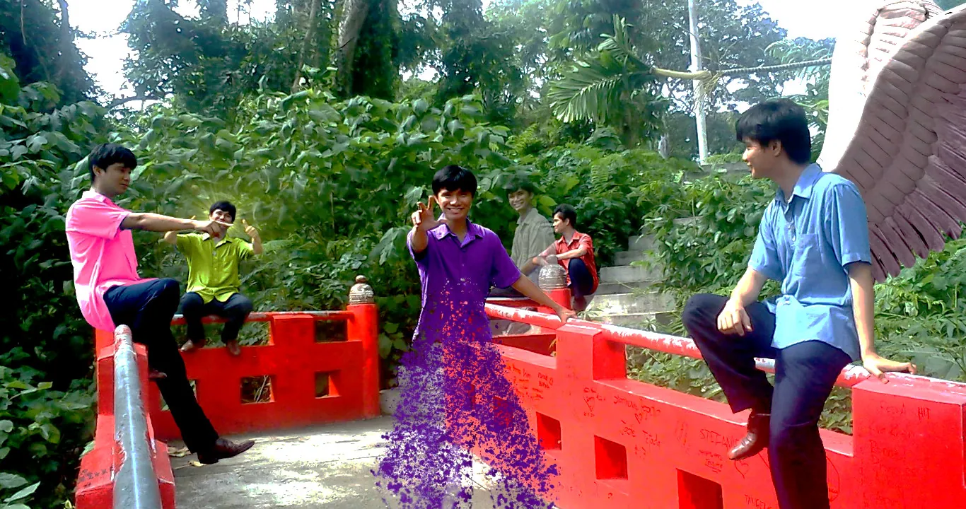 Khazu and friends on a red bridge, years ago